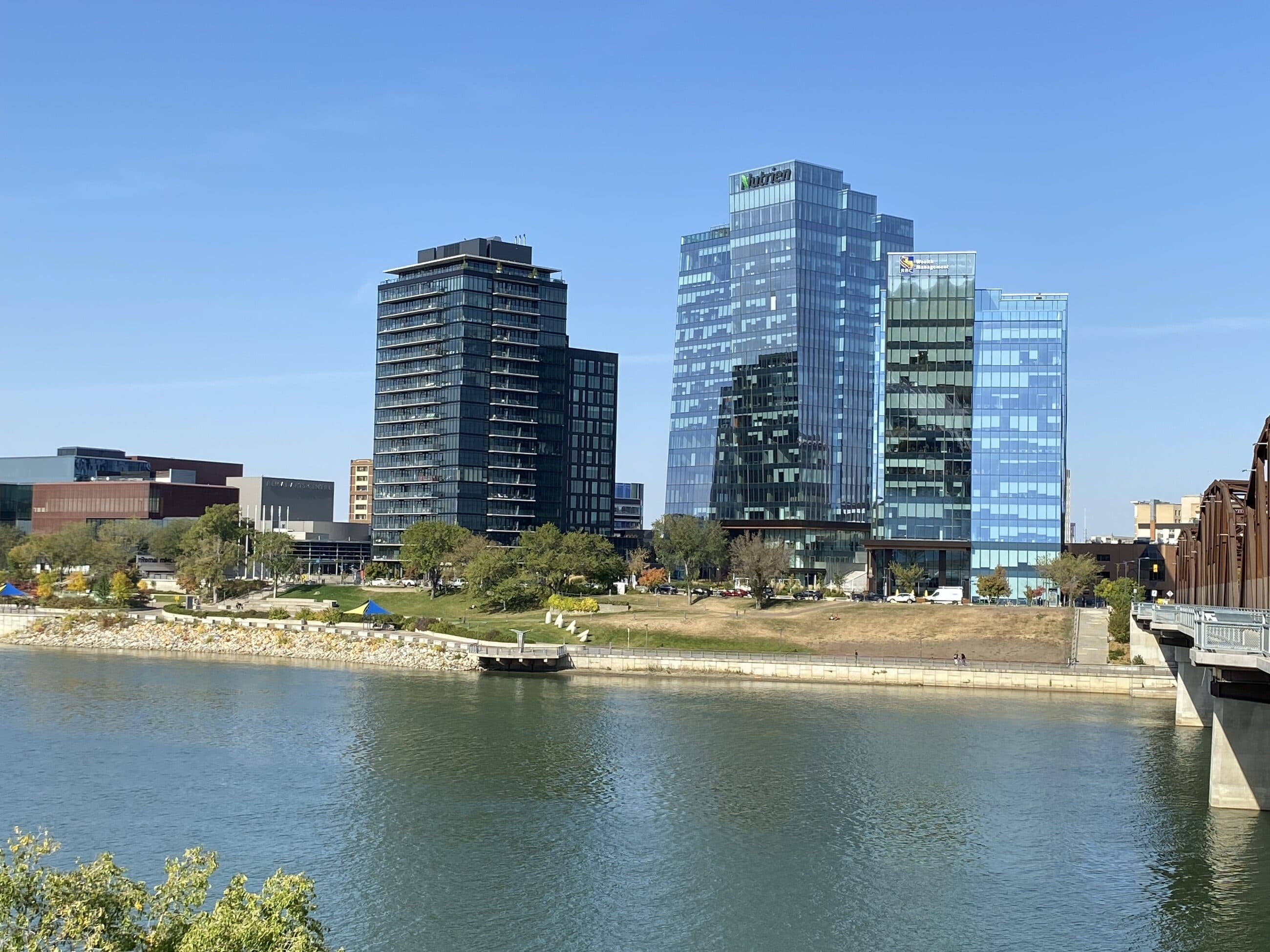 Saskatoon's riverfront with the Nutrien and RBC towers above the South Saskatchewan River